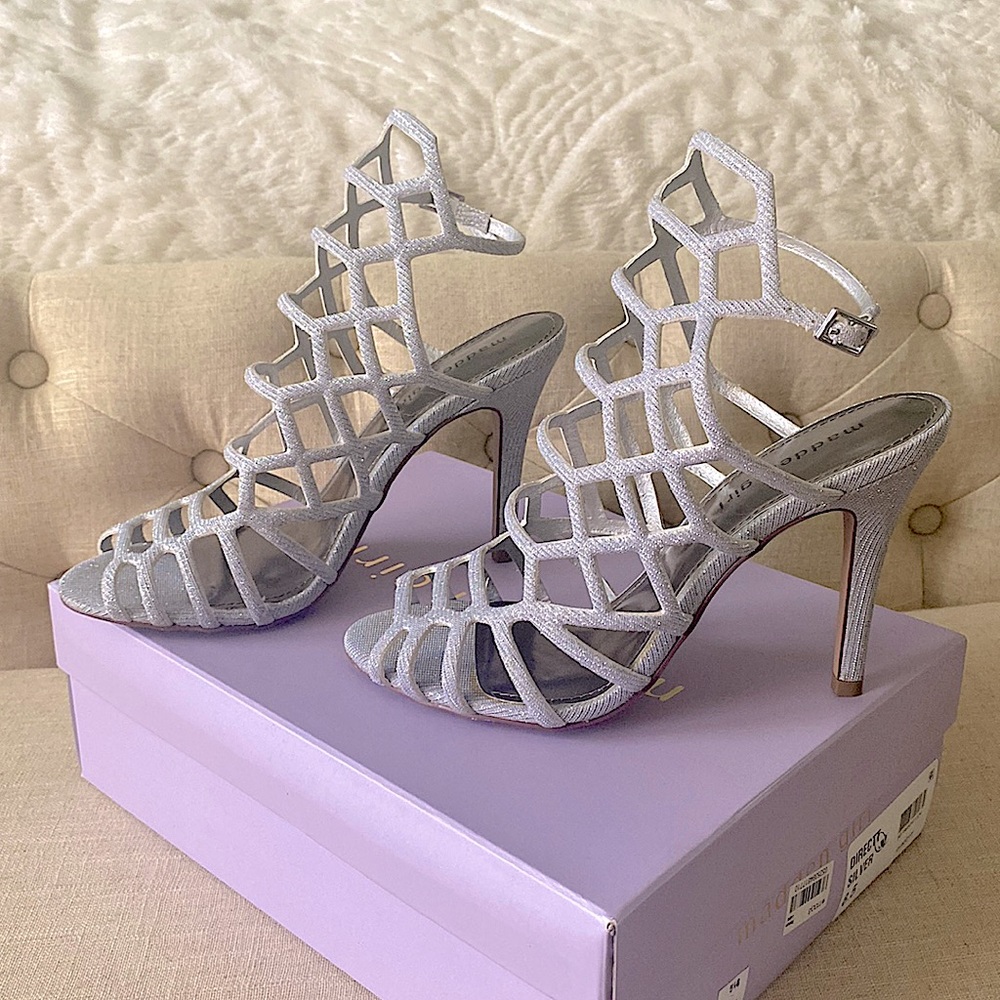 Beautiful Silver High Heel Shoes from MACY’S. Size 8.5 very comfotable.